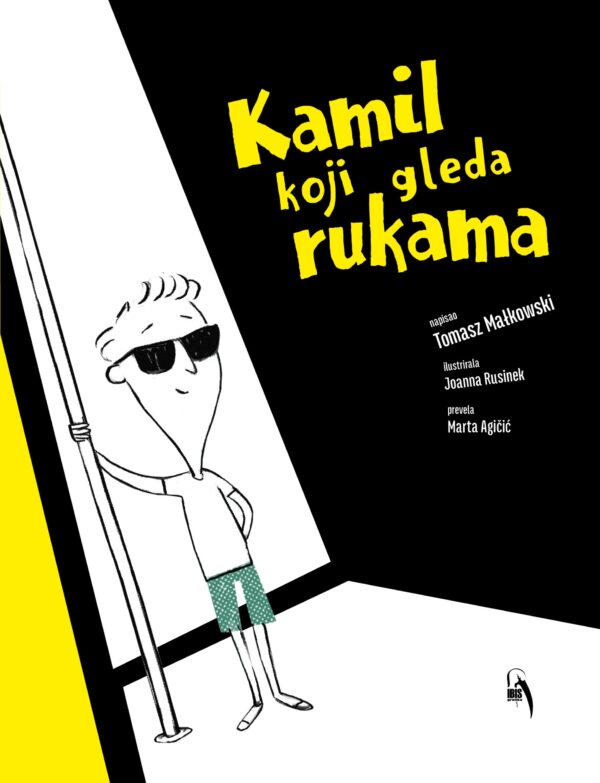 Kamil koji gleda rukama